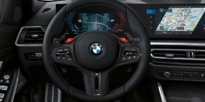 M Carbon steering wheel.